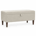 Panca contenitore in tessuto beige con gambe in legno